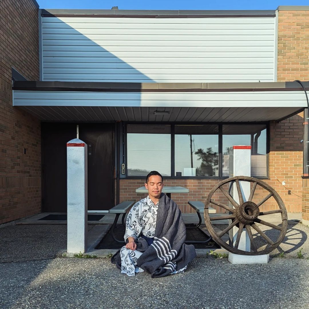 Day 11, meditation sit beside dhamma wheel.